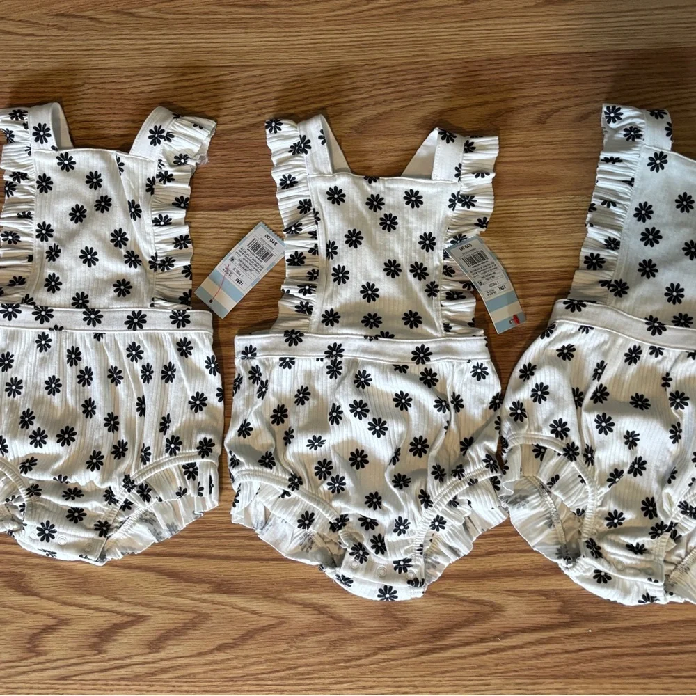 6 Cat & Jack…. 3 pink-(3 month old) 3 black and white-(12 month old)